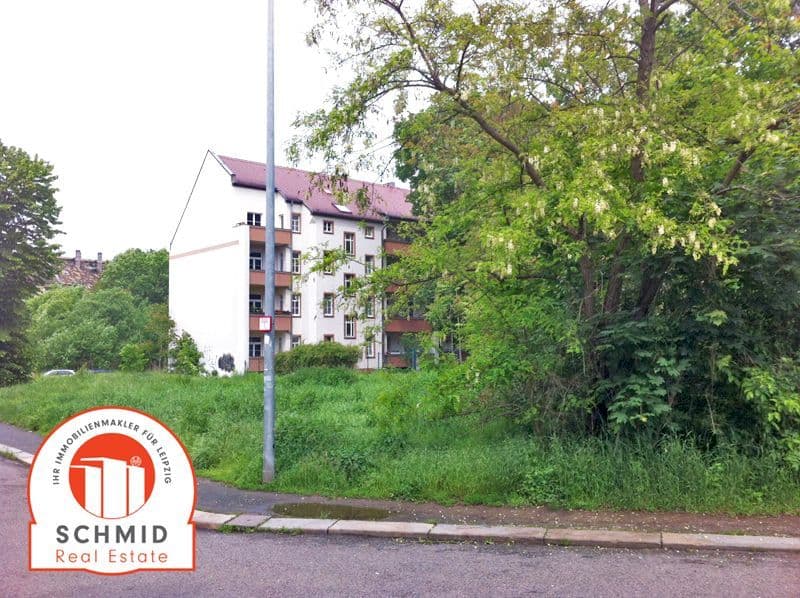 Bebautes Grundstück mit viergeschossigem Wohnhaus, rote Ziegeldächer, Schreiberstraße in Leipzig