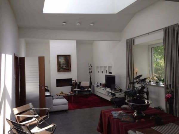 Wohnbereich mit Kamin, Kutscherhaus mit 164 m², vier Zimmern und zwei Bädern im Waldstraßenviertel in Leipzig